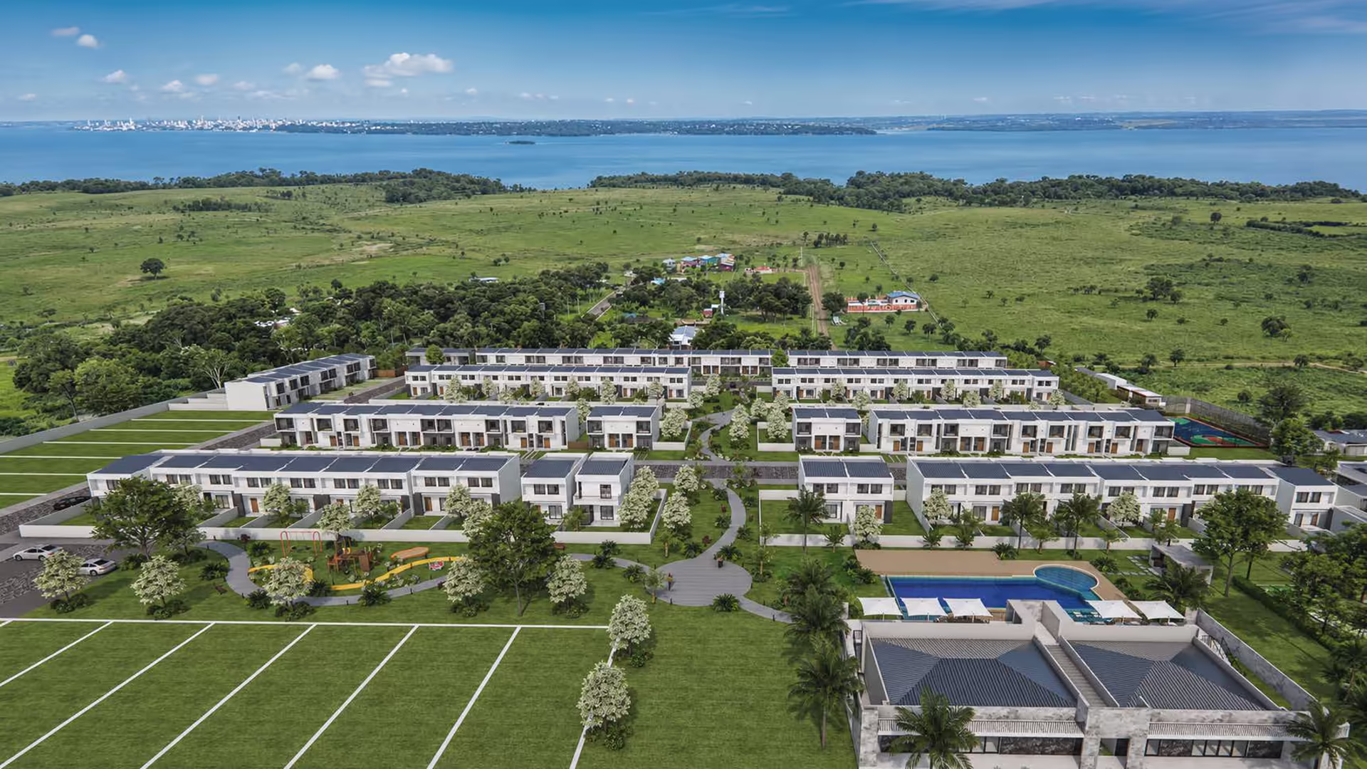 Vista aérea del condominio con el Río Paraná al fondo